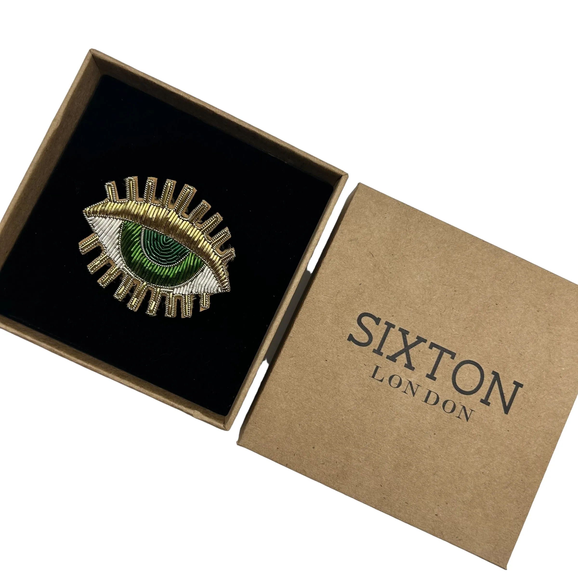 Double lashes green eyes pin / brooch